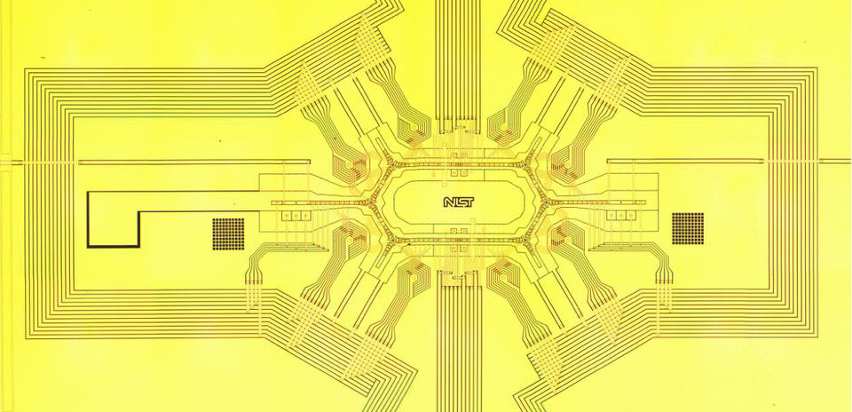 Photograph of NIST racetrack ion trap under development as possible hardware for a future quantum computer. 