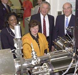 Officials are briefed about new nanotechnology research at the National Institute of Standards and Technology after the ceremonial groundbreaking for the Advanced Measurement Laboratory.