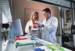 NIST staff members John Butler and Susan Ballou discuss a NIST project for improving forensic analysis of human DNA. 
