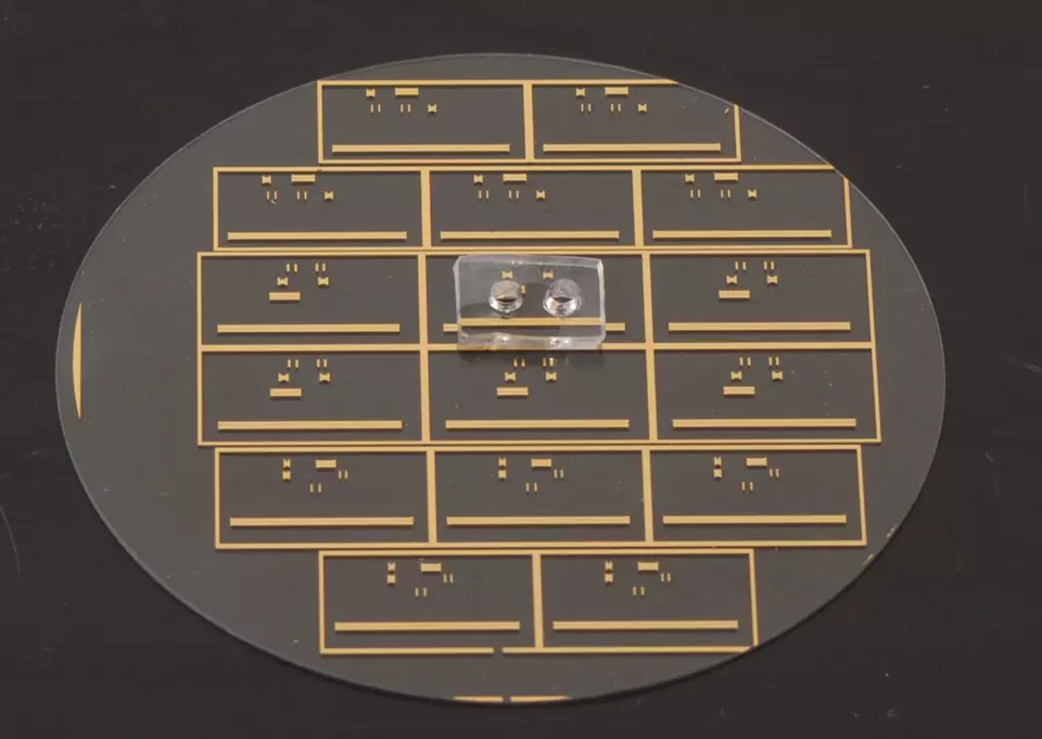 Close up photograph of the NIST micro microwave oven showing its two major components