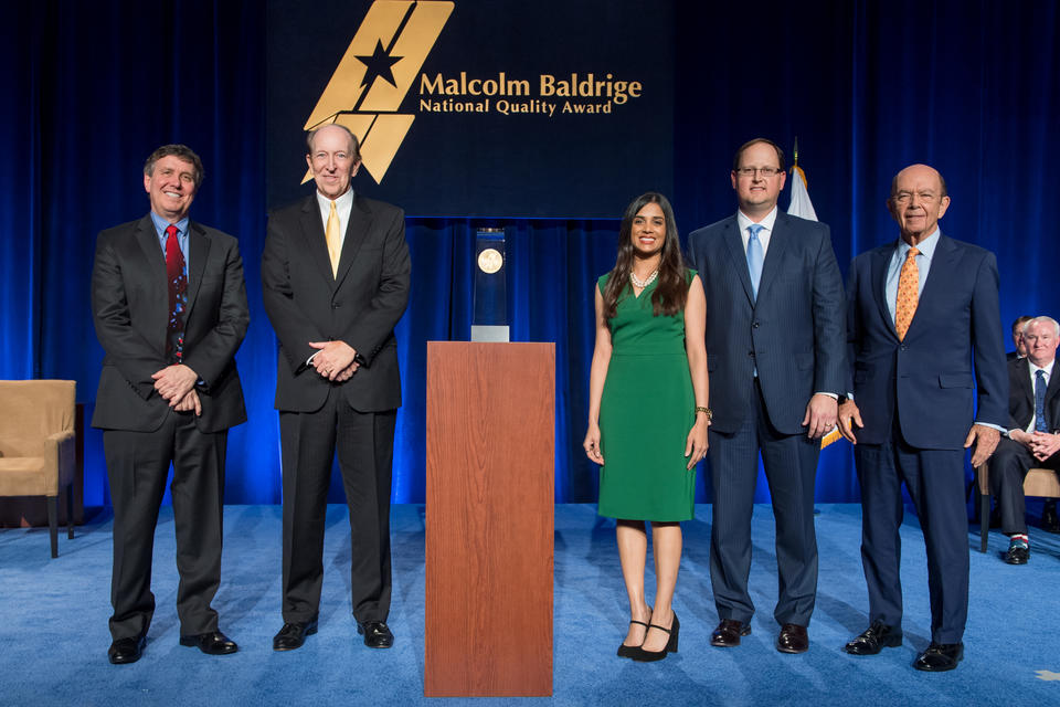 Photo of representatives from 2016 Baldrige winner Memorial Hermann with DOC and Baldrige representatives