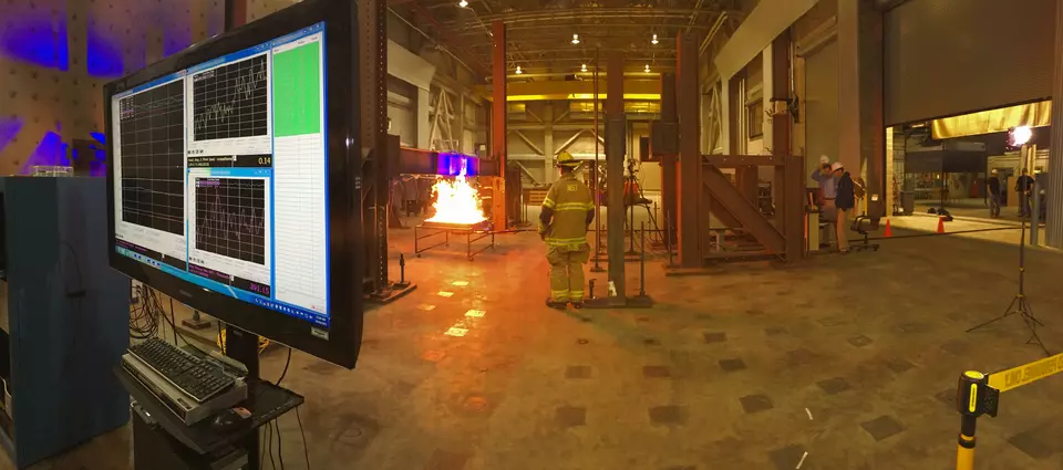 NIST Firefighter Overseeing Burn
