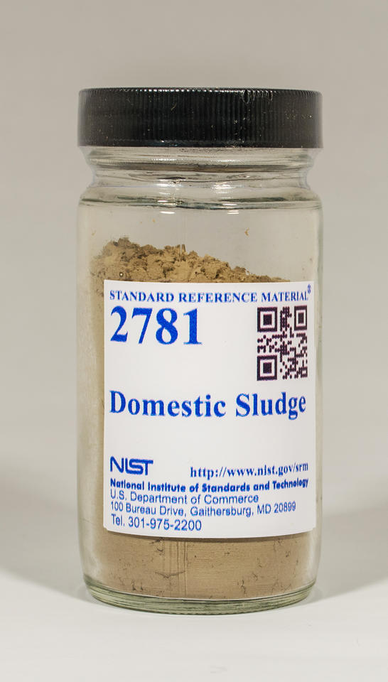 photo of a bottle of brown powder labeled NIST SRM 2781.