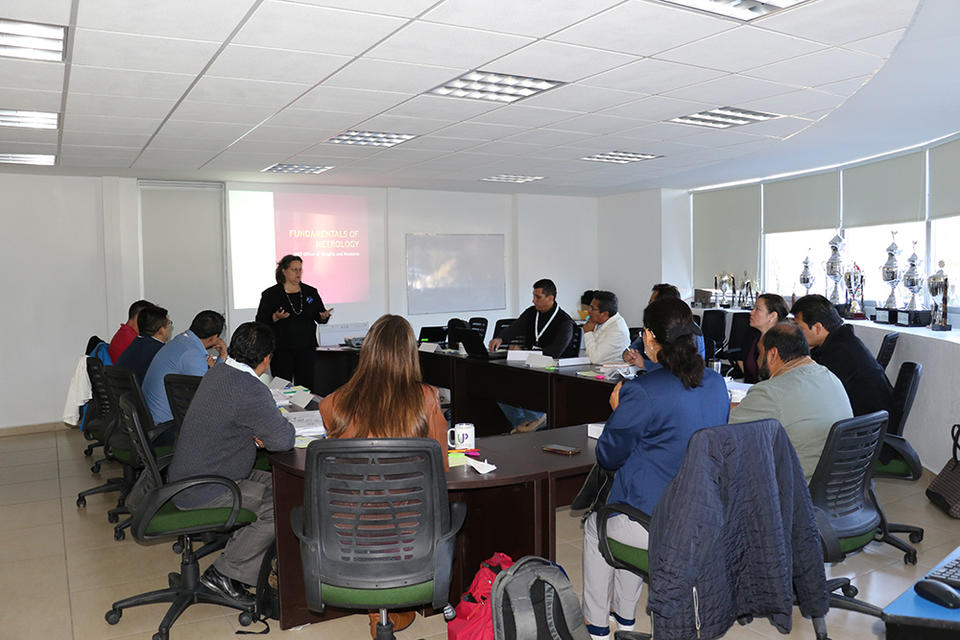 Georgia Harris teaching metrology in Mexico