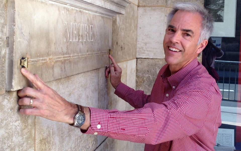 Doug Olson with an engraved meter in Paris