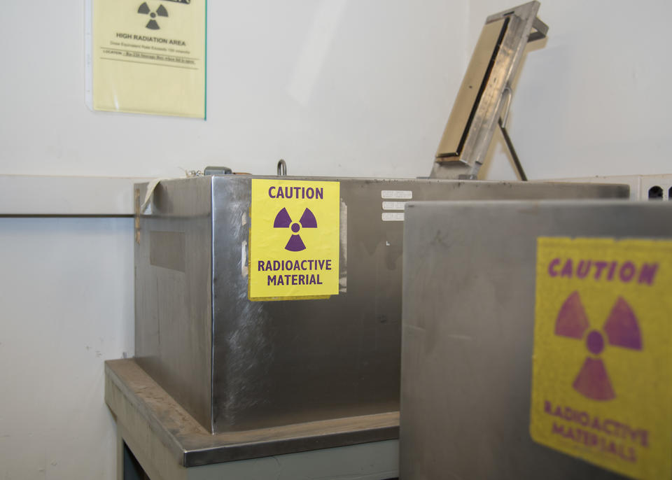Silver box with radioactive materials sign