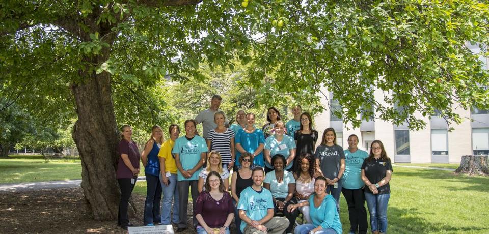 Group of people under a tree