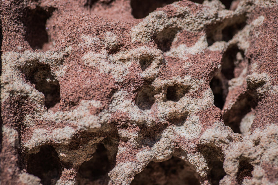 Asteroid-like landscape formed of red and gray sandstone from Marquette, Michigan