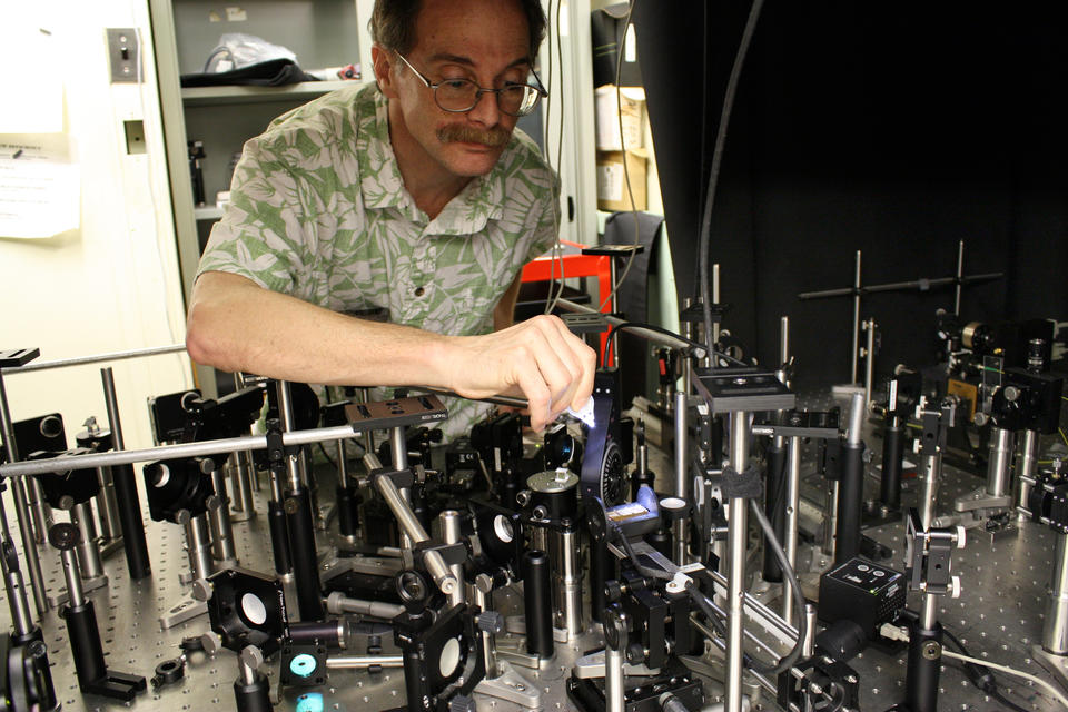 Researcher with equipment