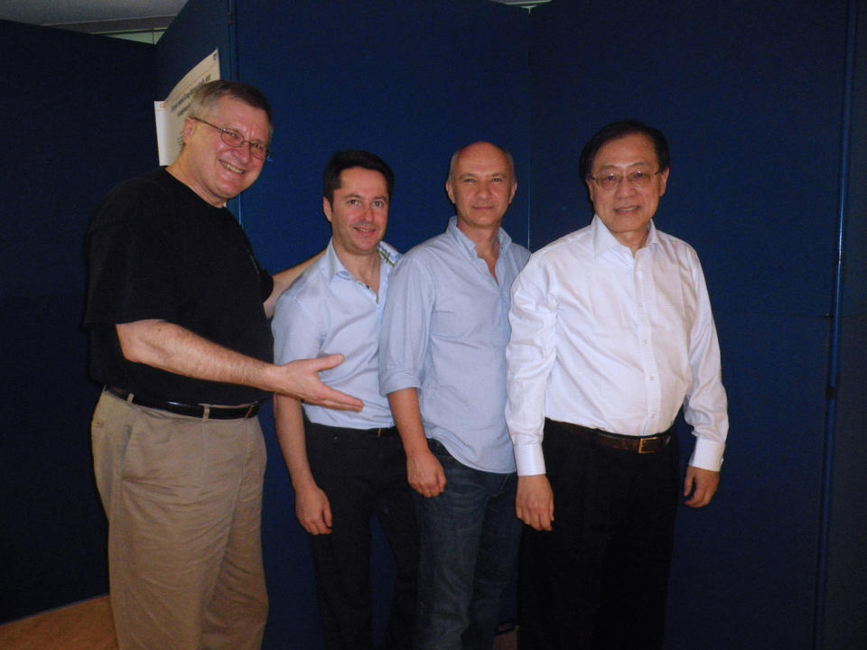 2011 picture from left to right of Charles Clark, Ignacio Cirac, Artur Ekert, and Andrew Chi-Chih Yao