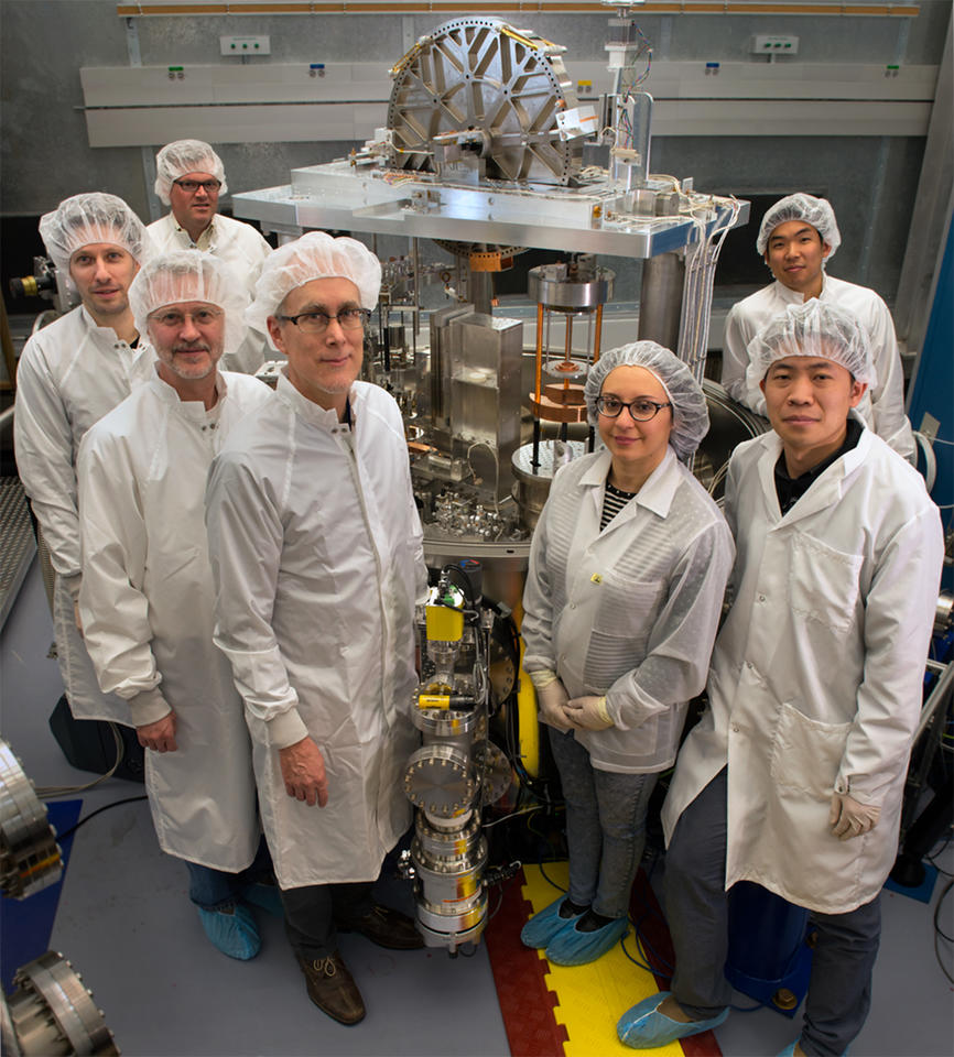Group of scientists in clean room gear