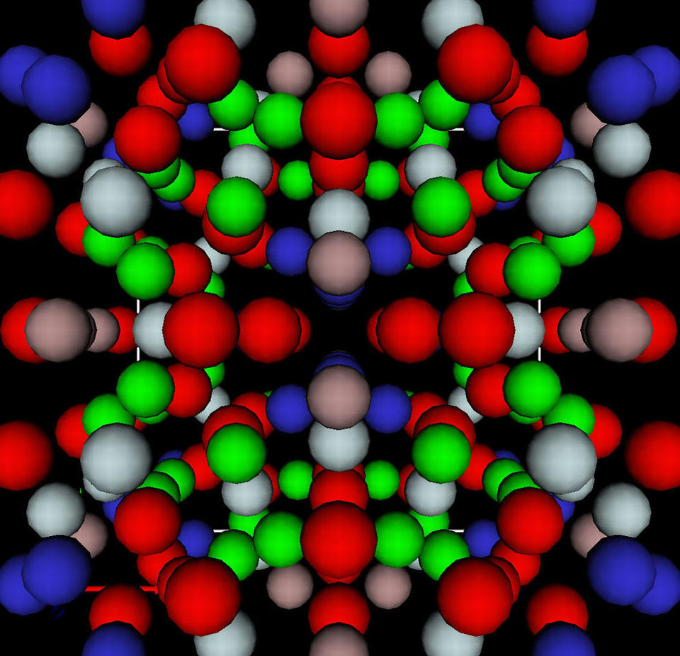 red, blue, grey, brown and blue spheres representing aluminum, lithium and copper atoms organized in a geometric pattern