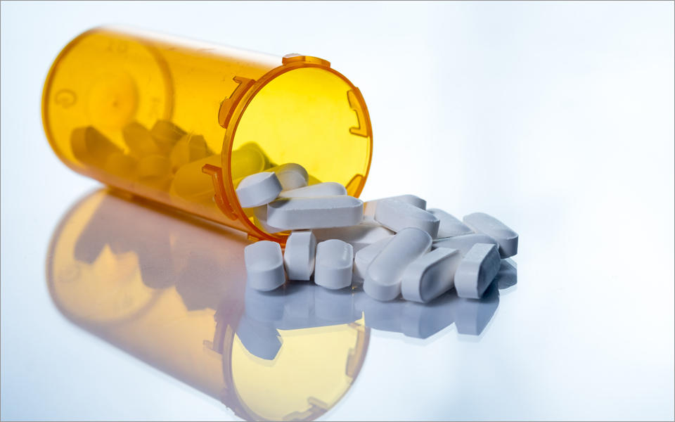 Baldrige Can Help the Opioid Crisis blog photo showing a photo of a bottle of pills spilled on a table.