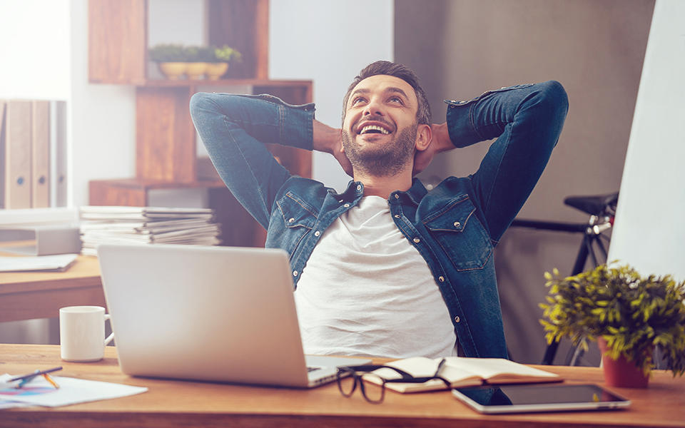 man satisfied with his computing experience