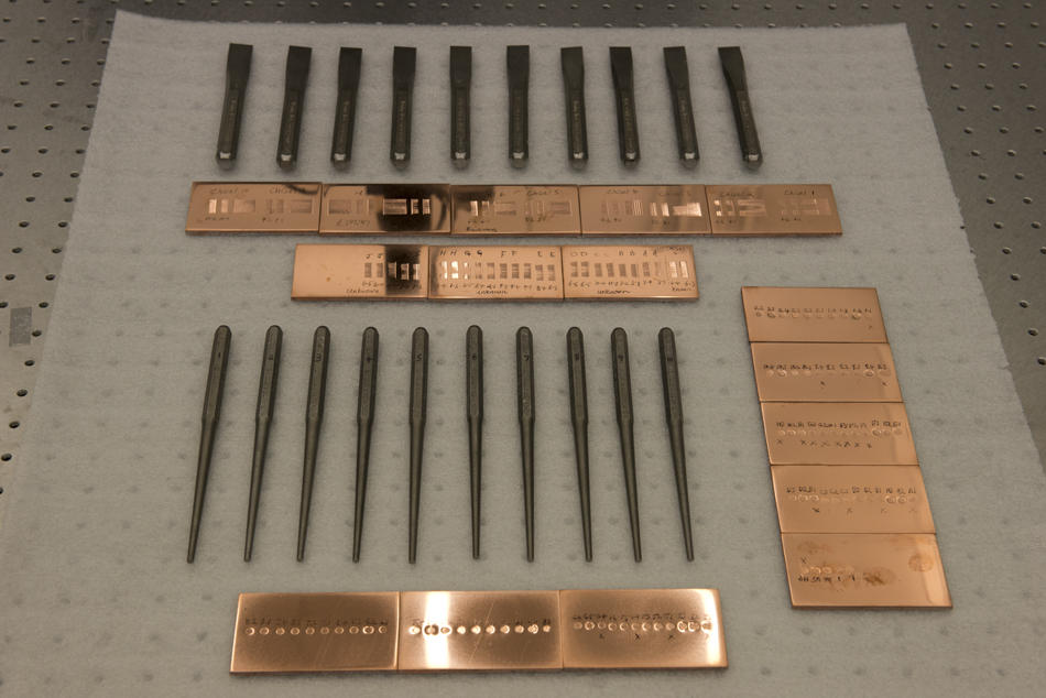 Toolmarks made on Zheng's rig from chisels (top) and drift punches (bottom and right).