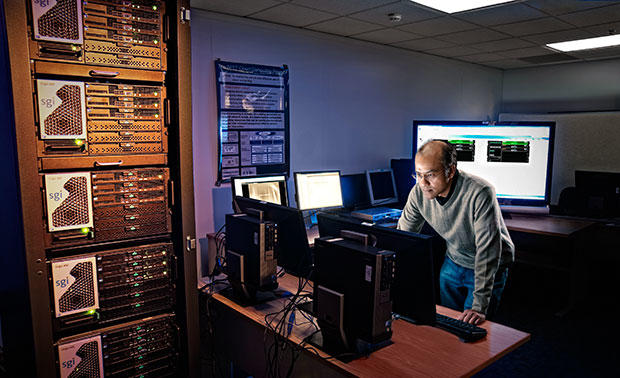 Murugiah Souppaya works in a computer lab at the National Cybersecurity Center of Excellence.