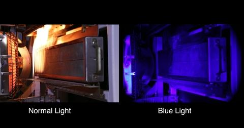 In this photo, we see a split-screen image of a laboratory fire. The left side shows the fire obscuring the view of an object behind it while the right side shows the same object with the clarity dramatically enhanced using ordinary blue light.