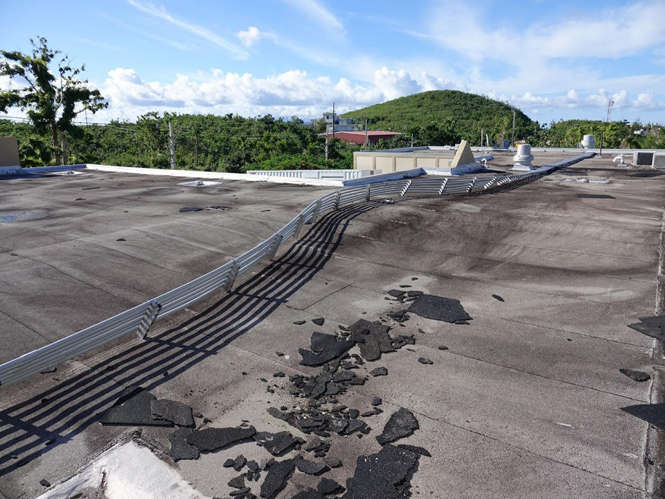 Damaged cable tray on hospital roof in Vieques, Puerto Rico