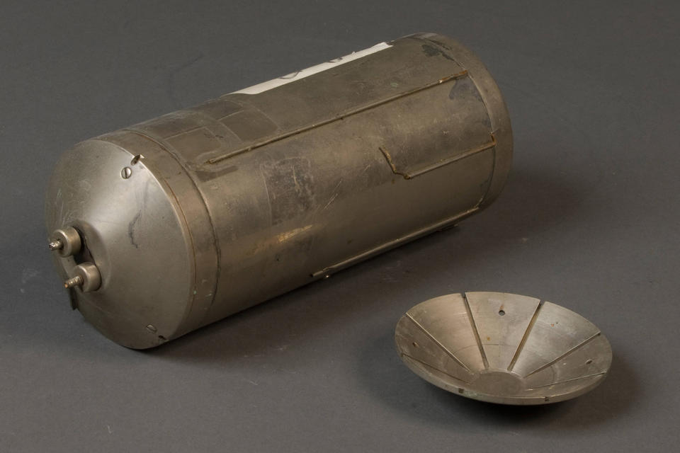 a silver colored metal cylinder with end caps