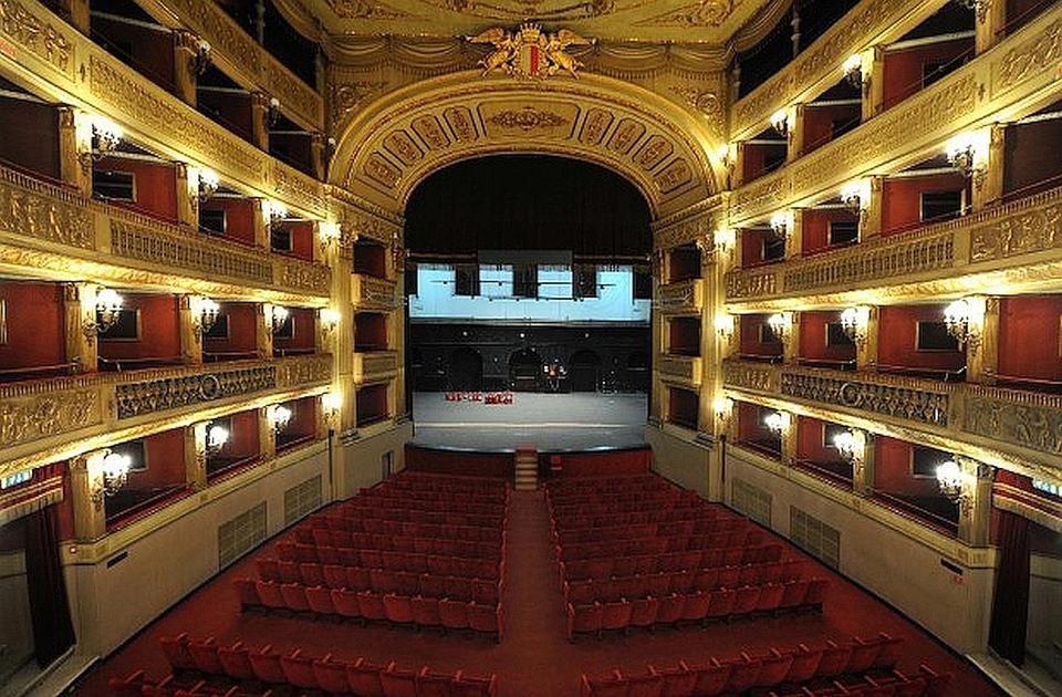 Interior of the Teatro Piccinni: Horseshoe-shaped performance area with four tiers of boxes