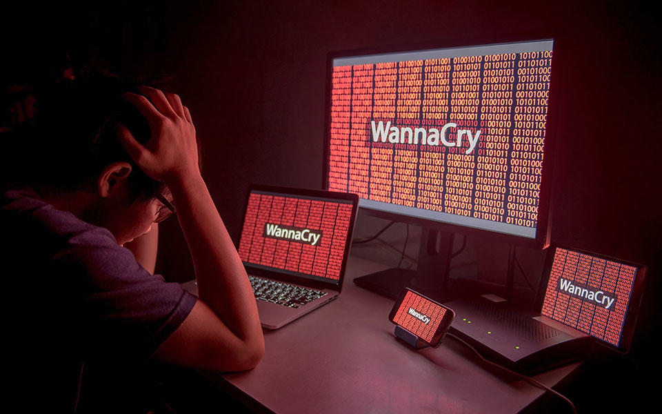 Man at WannaCry computer