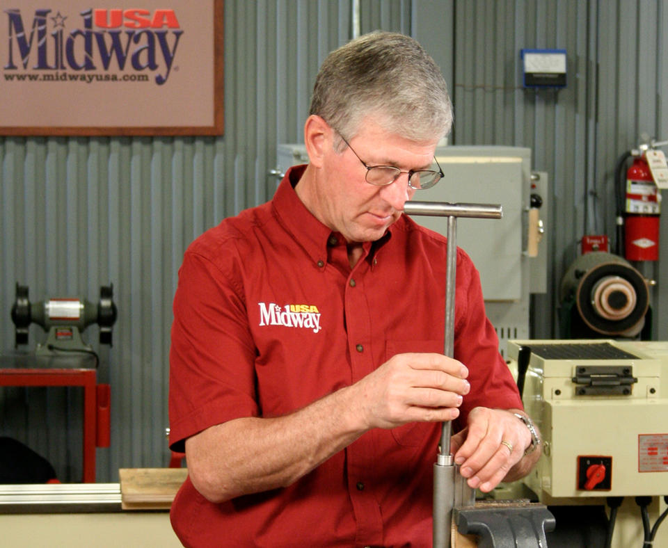 MidwayUSA, 2009 Malcolm Baldrige National Quality Award Recipient photo of man working in a small business shop.