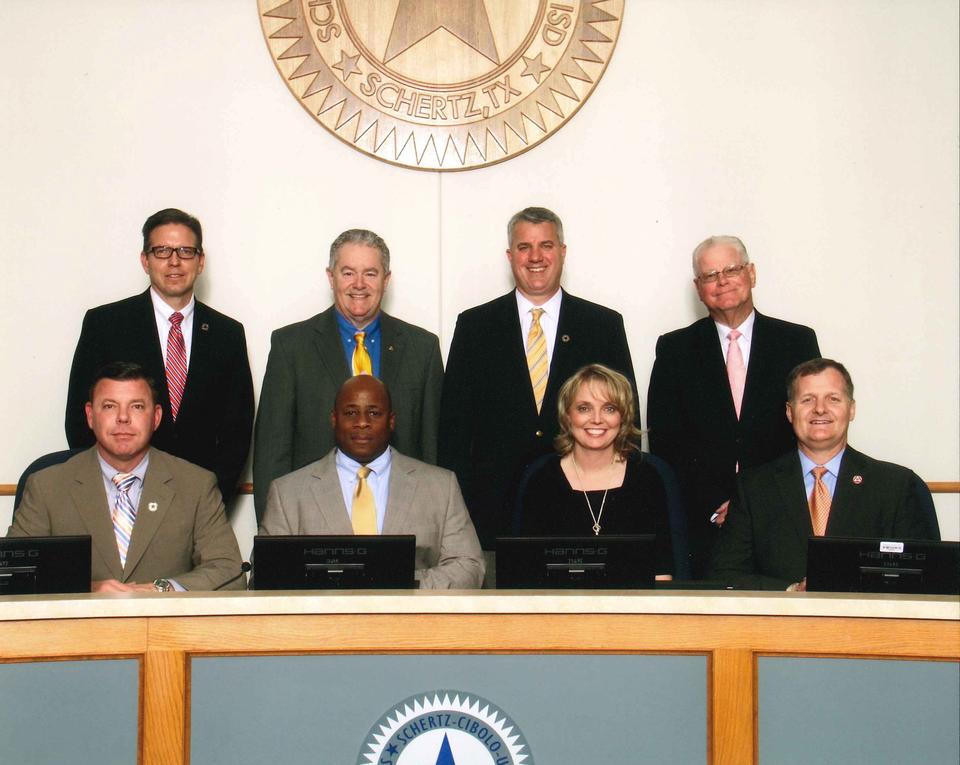 SCUC ISD Board members stand in two rows