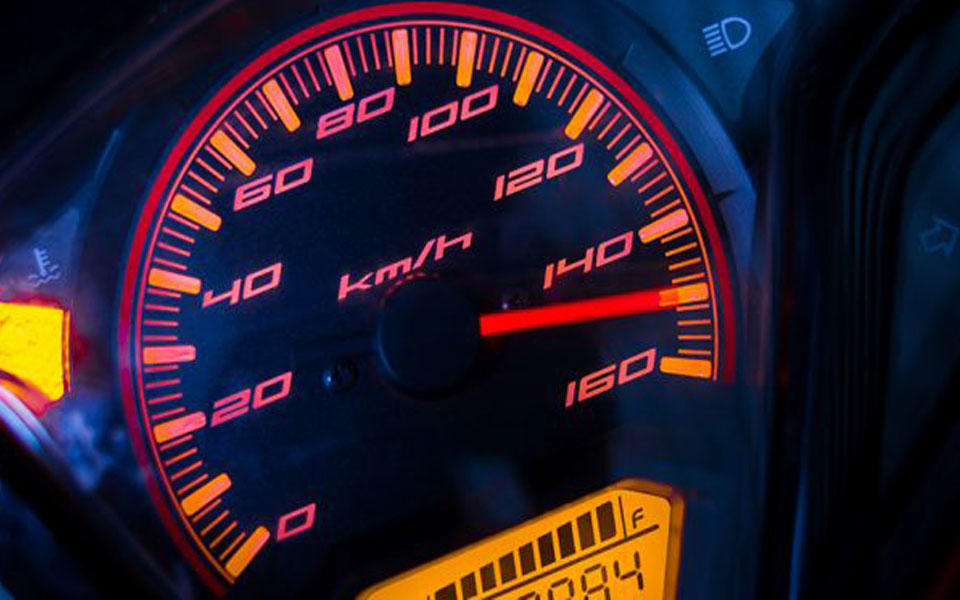 photo of black odometer encircled in red with pink numbers and yellow odometer at bottom