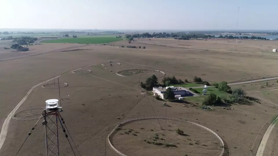 photo taken from an airplane, looking down on the buildings and antennae of the WWV radio station in rural Colorado