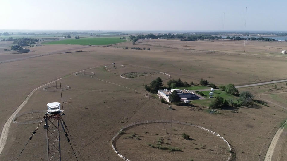photo taken from an airplane, looking down on the buildings and antennae of the WWV radio station in rural Colorado