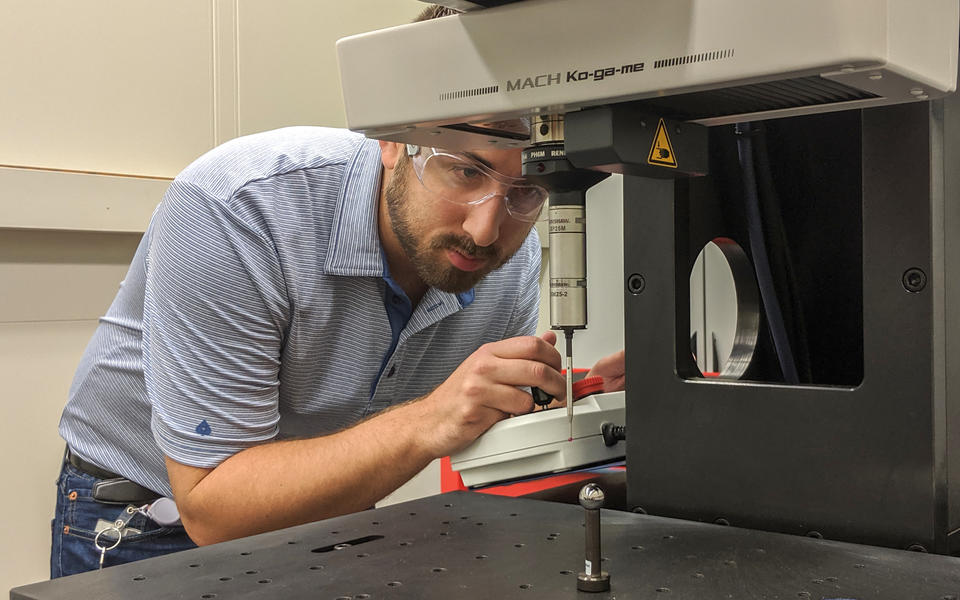 man operating a coordinate measuring machine