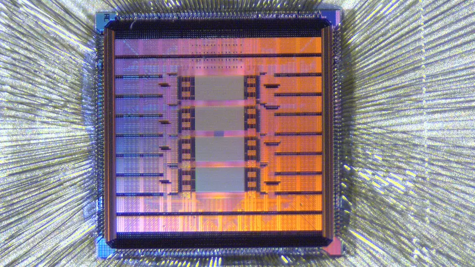 A dense grid of purple, blue and red lines on a square platform.