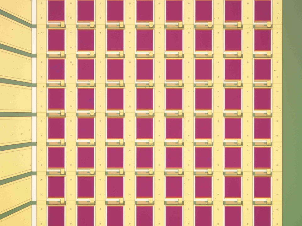 Sensor chip is a yellow grid with pink squares and green along the edges.