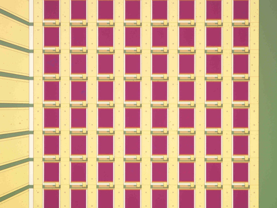 Sensor chip is a yellow grid with pink squares and green along the edges.
