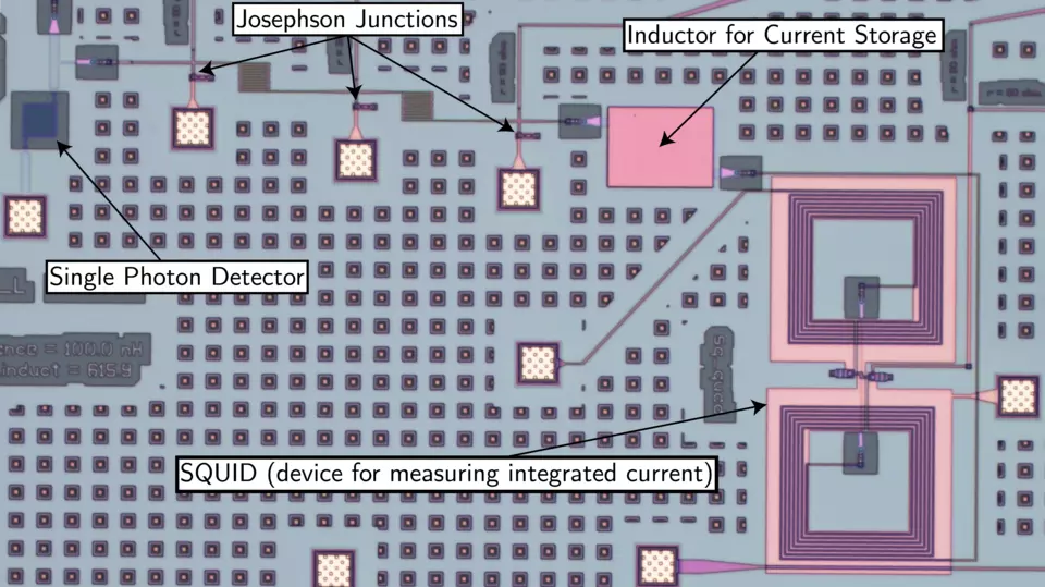 Photo of an electronic circuit with various components appearing as larger and smaller squares.