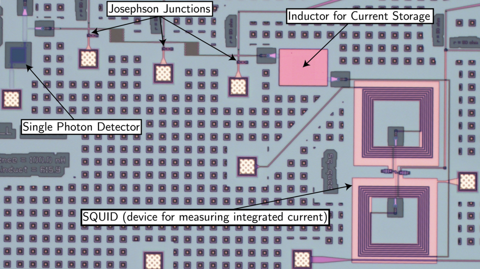 Photo of an electronic circuit with various components appearing as larger and smaller squares.