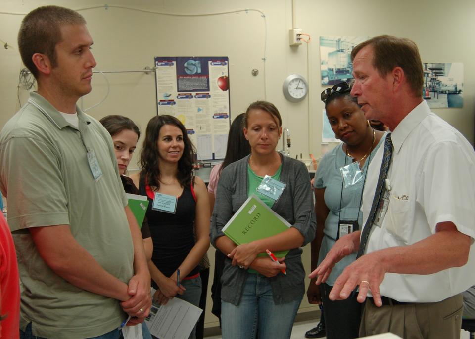 Rick Harshman instructing students