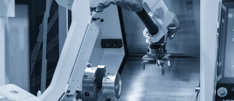 The CNC lathe machine operation with automatic loader by robotic arm
