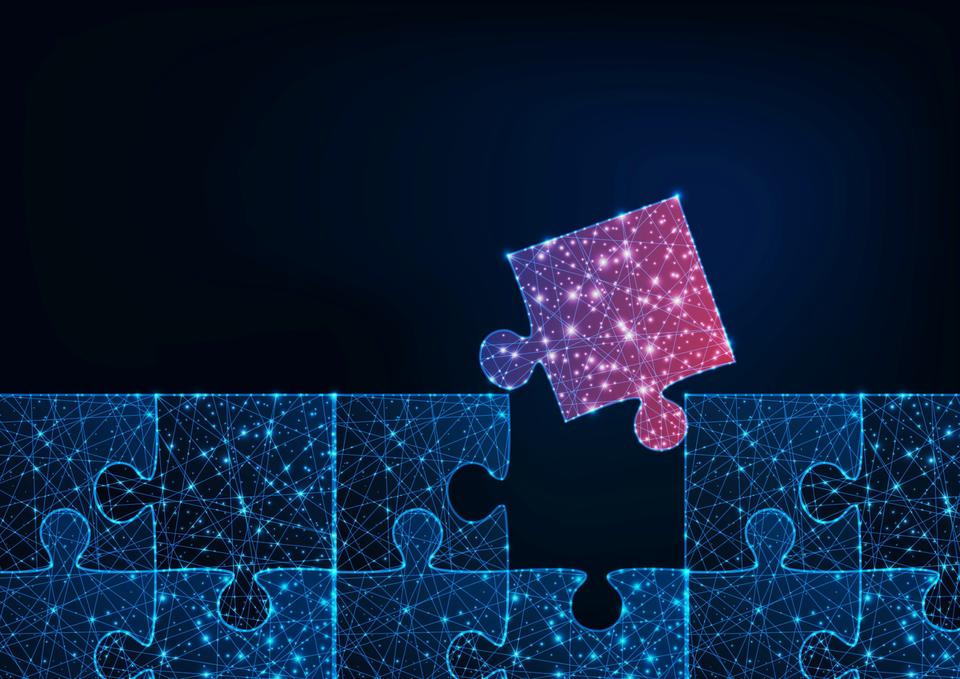 Glowing puzzle pieces with one piece not yet connected