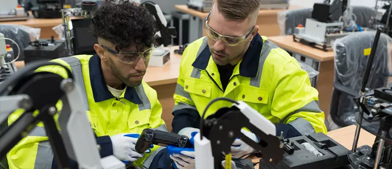 Two male engineers training