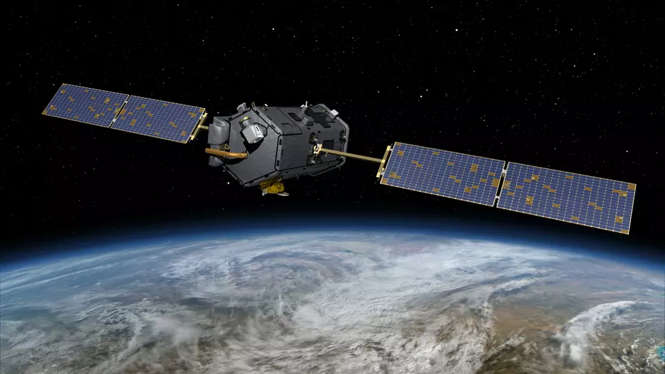 Illustration shows a satellite with solar panels off to each side floating in space above the Earth. 