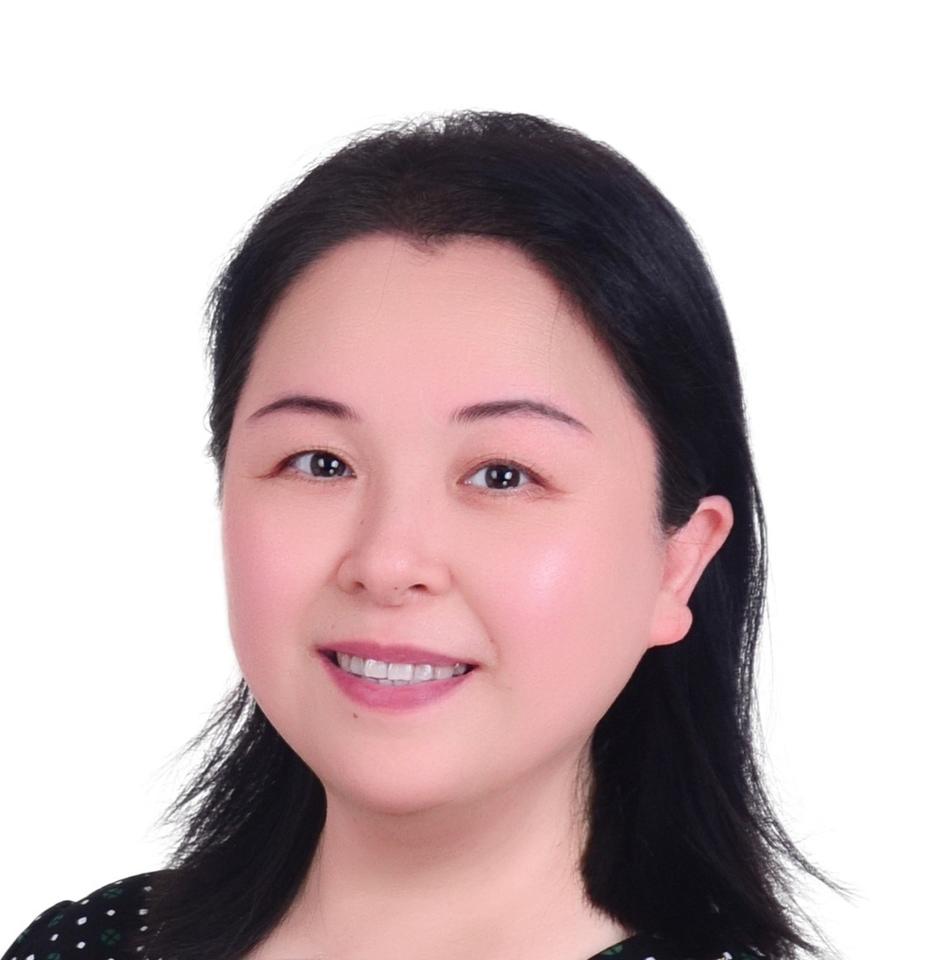 headshot of a woman with dark hair