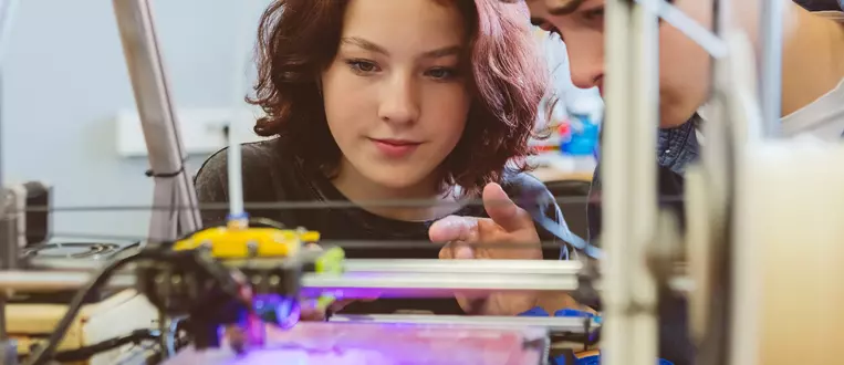 High school students watching 3d print