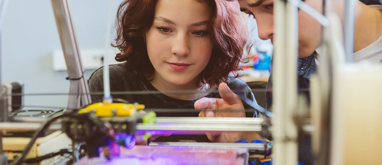High school students watching 3d print