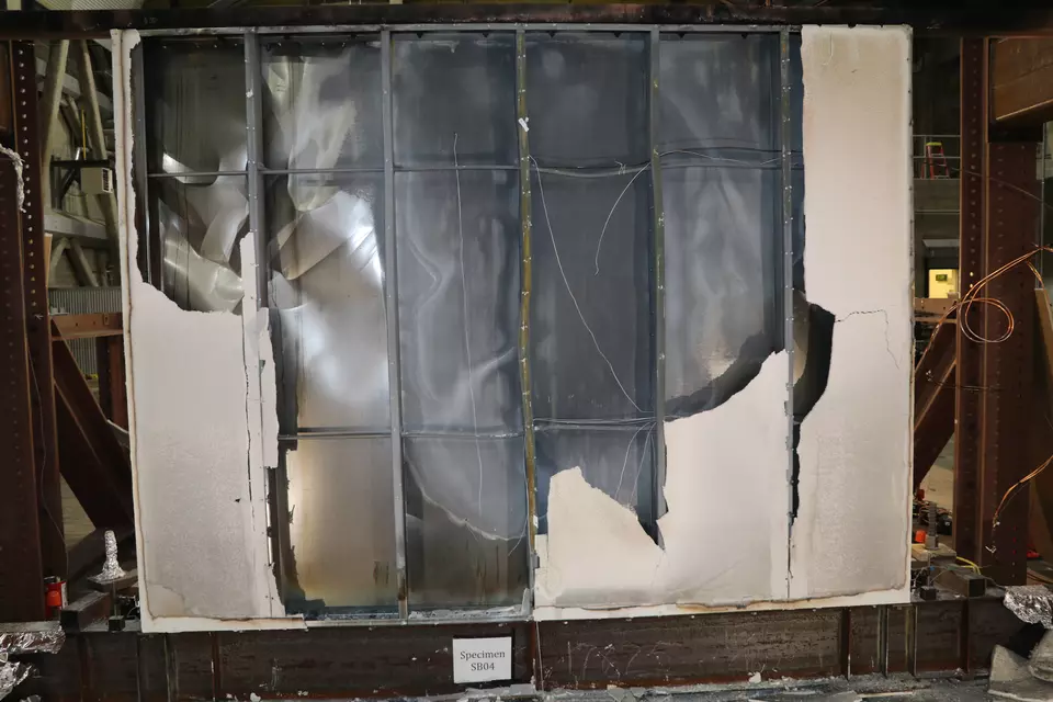 Steel wall with covering burned off