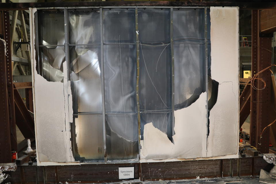 Steel wall with covering burned off
