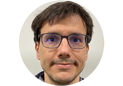 Mauro Mugnai, a person with short brown hair and glasses