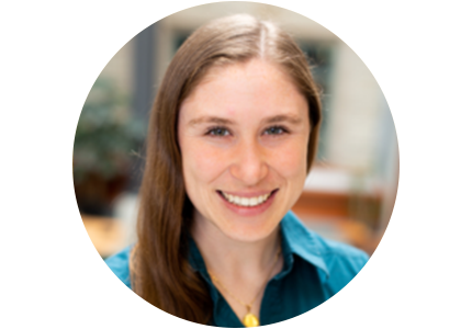 person with long brown hair, smiling