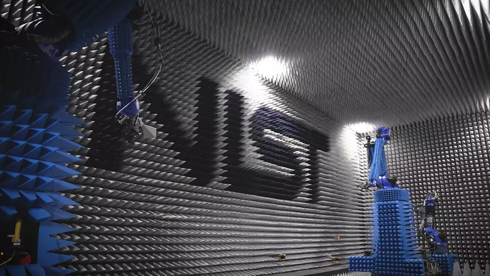 Photo of antenna lab with  NIST logo in the background