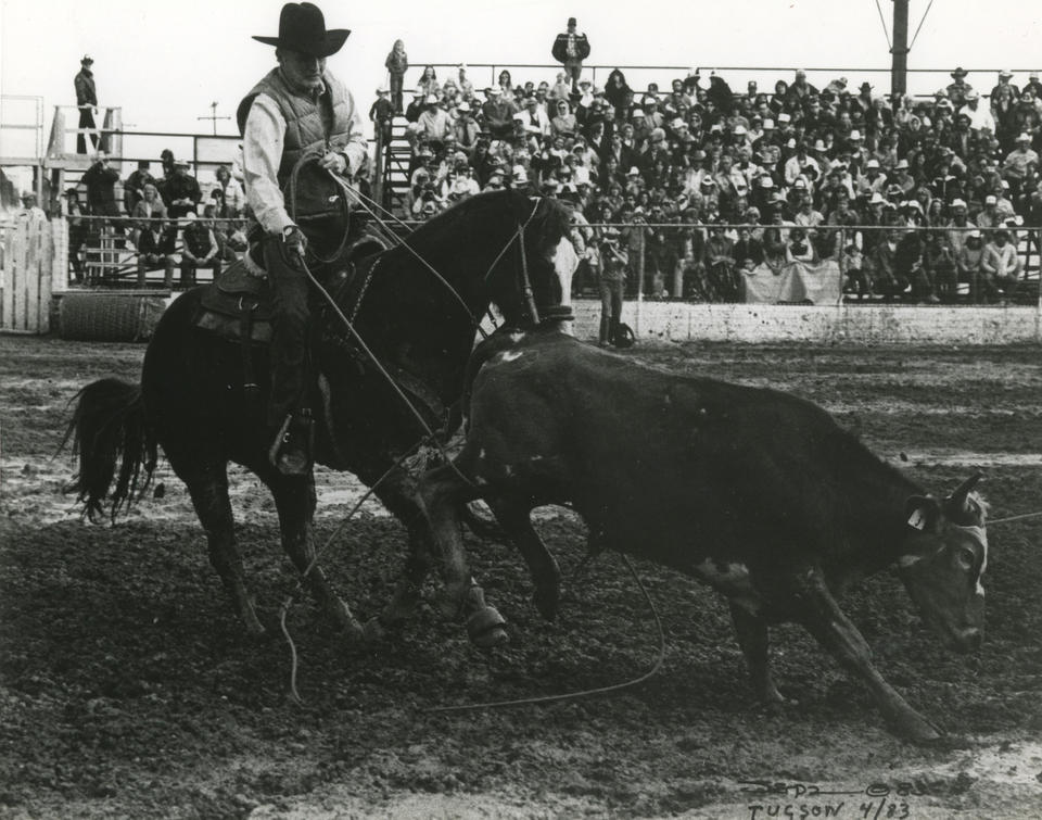 Malcolm Baldrige participating in a rodeo.